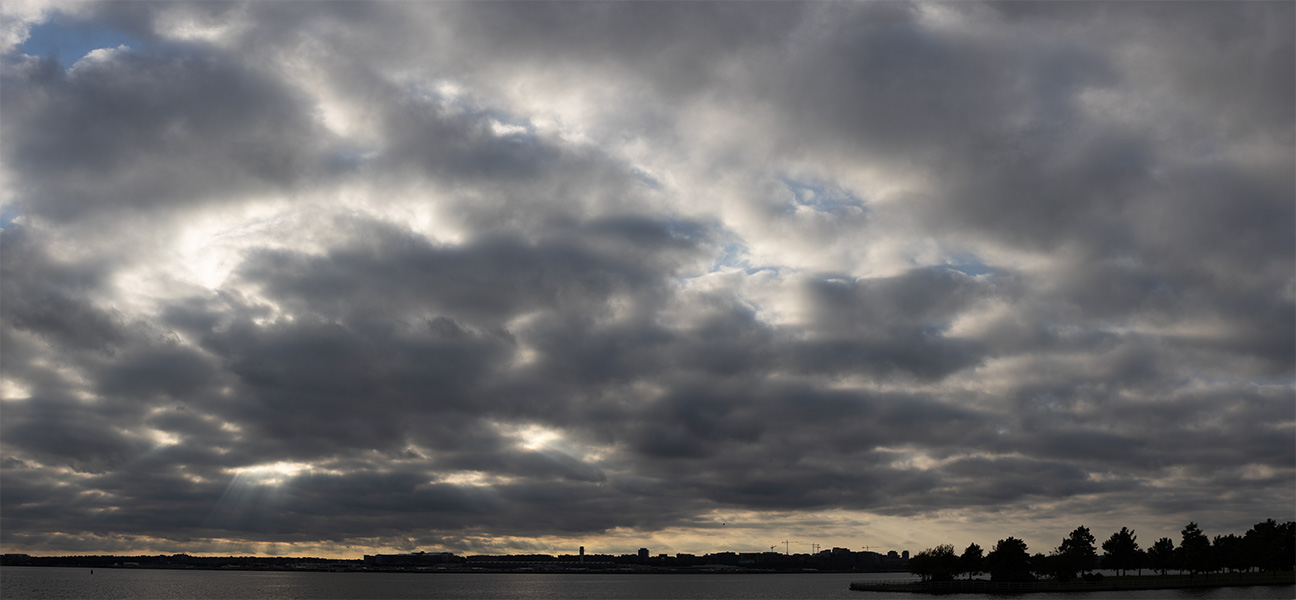 Panoramic Photo of Spectacular Sky Over River.